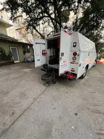 Magnet Plumbing service vehicle on-site for Water Heater Repair in Woodlane
